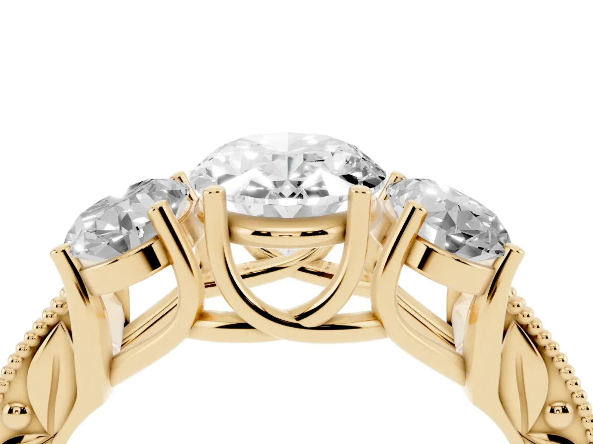 Three-Stone Oval Cut Cut Milgrain Pavé Engagement Ring Yellow gold