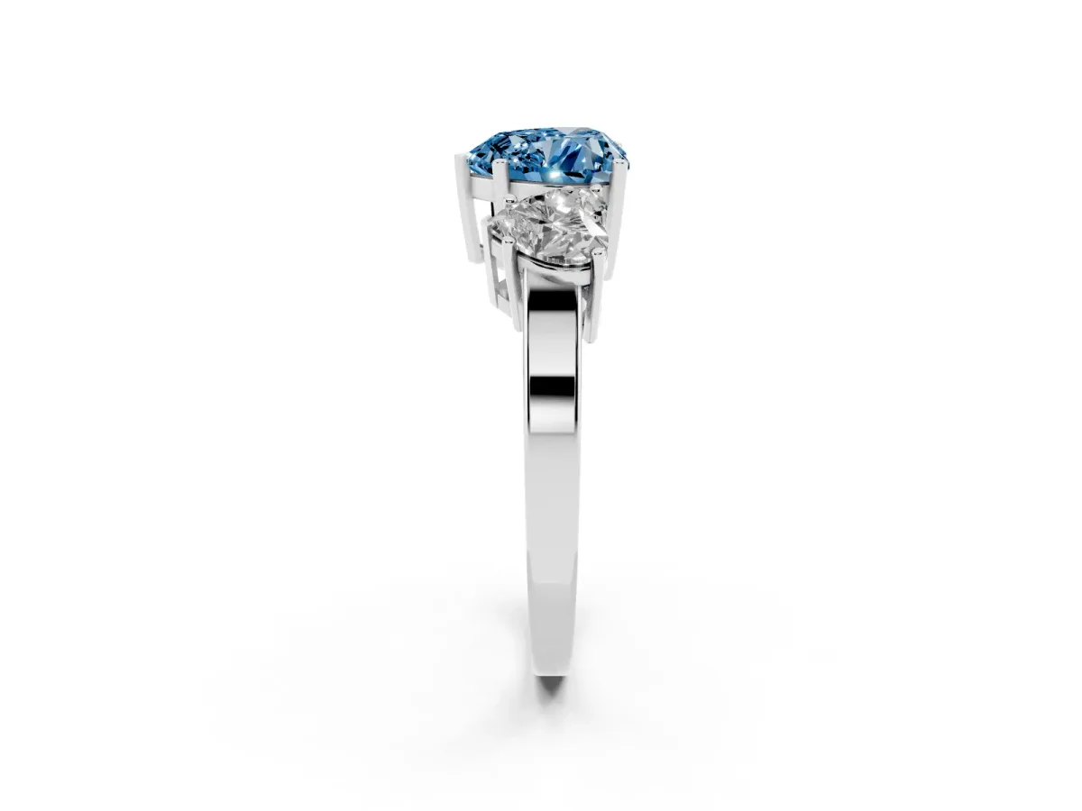Fancy Blue Three-Stone Heart Cut Cut Diamond Engagement Ring with Flat Band and Four-Prong Setting Silver