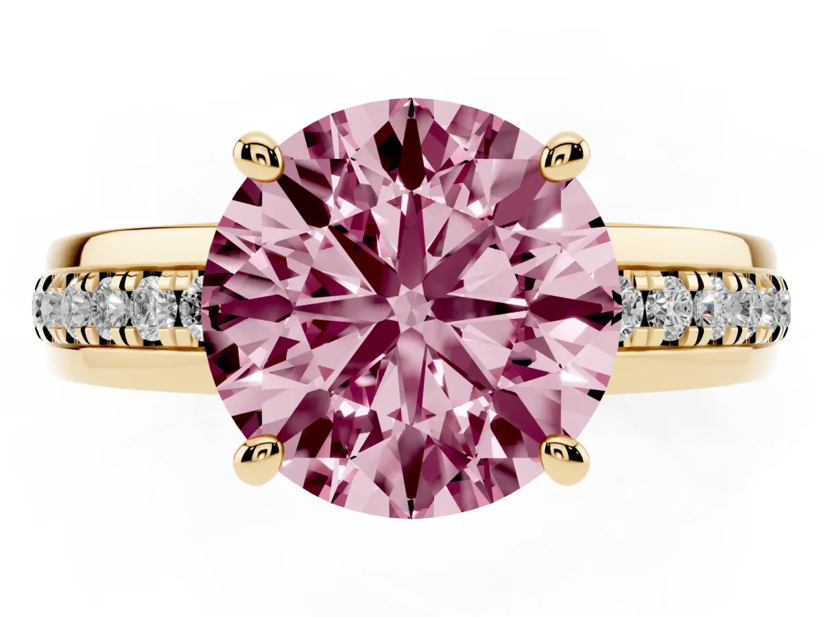 Fancy Pink Round Cut Solitaire Diamond Ring with Channel Set Band and Six-Prong Setting Yellow gold