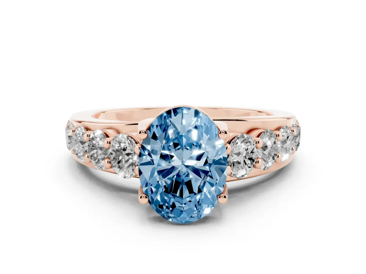 Fancy Blue Oval Cut Diamond Engagement Ring with Pavé Band and Four-Prong Setting Rose gold