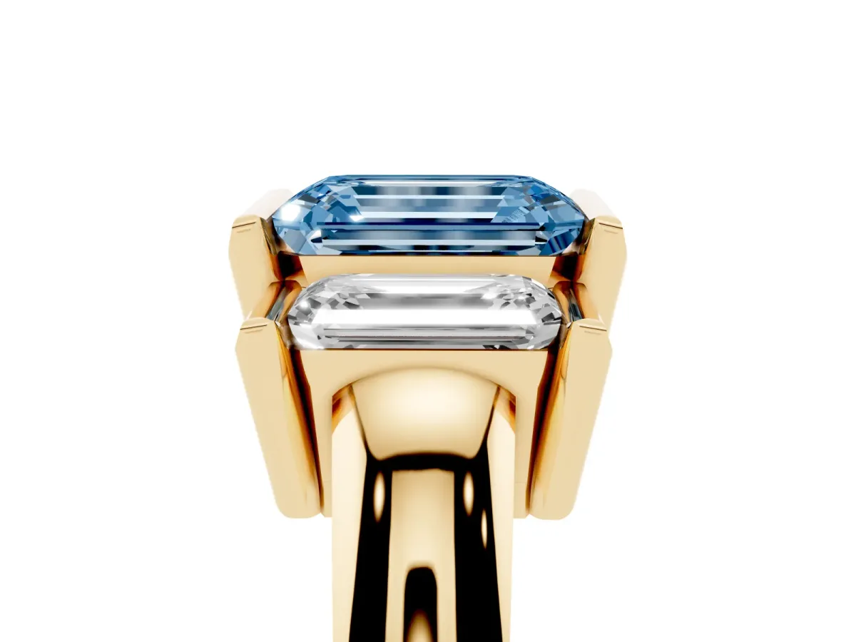 Fancy Blue Three Stone Emerald Cut Cut Channel Set Diamond Ring Yellow gold
