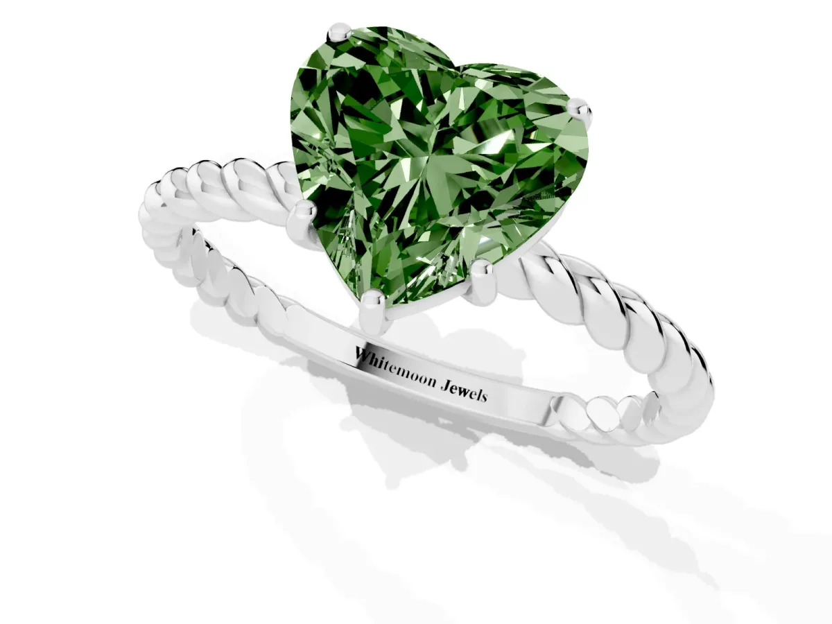Fancy Green Heart Cut Solitaire Twist Band Ring with Four-Prong Setting Silver