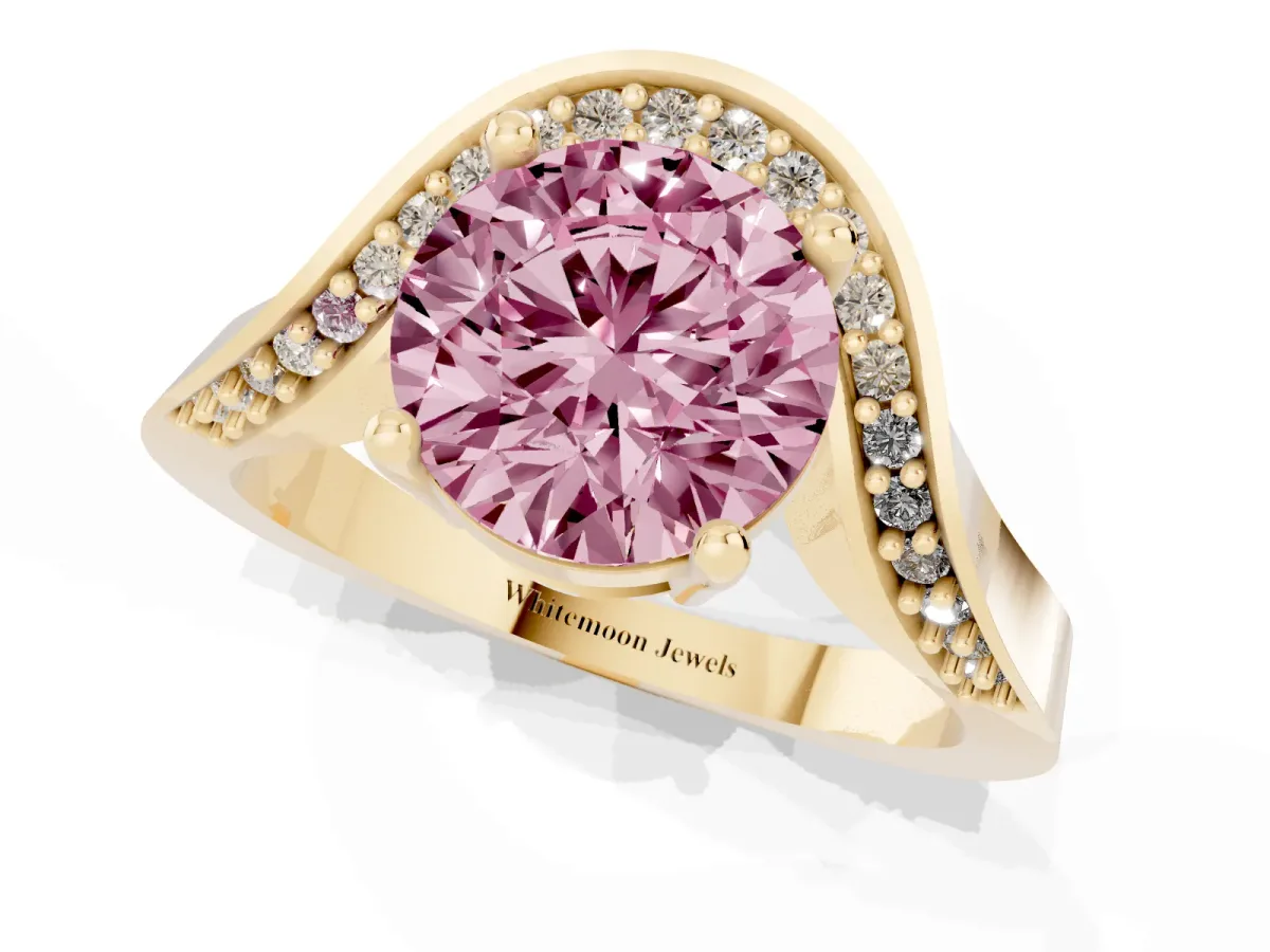 Fancy Pink Round Cut Solitaire Diamond Engagement Ring with Pave Band and Four-Prong Setting Yellow gold