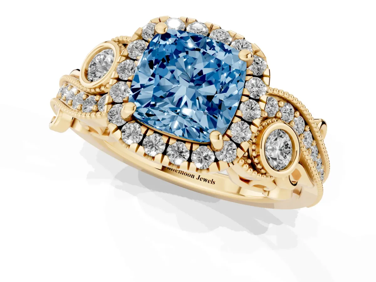 Fancy Blue Cushion Cut Diamond Halo Ring with Milgrain Pavé Band and Four-Prong Setting Yellow gold