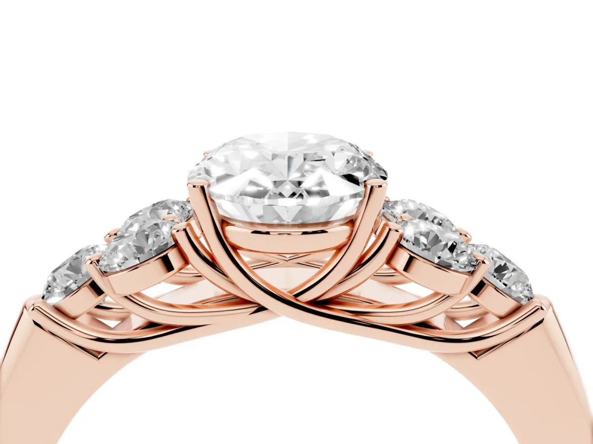 Oval Cut Cut Diamond Cluster Ring with Round Accent Stones and Prong Setting on a Classic Band Rose gold