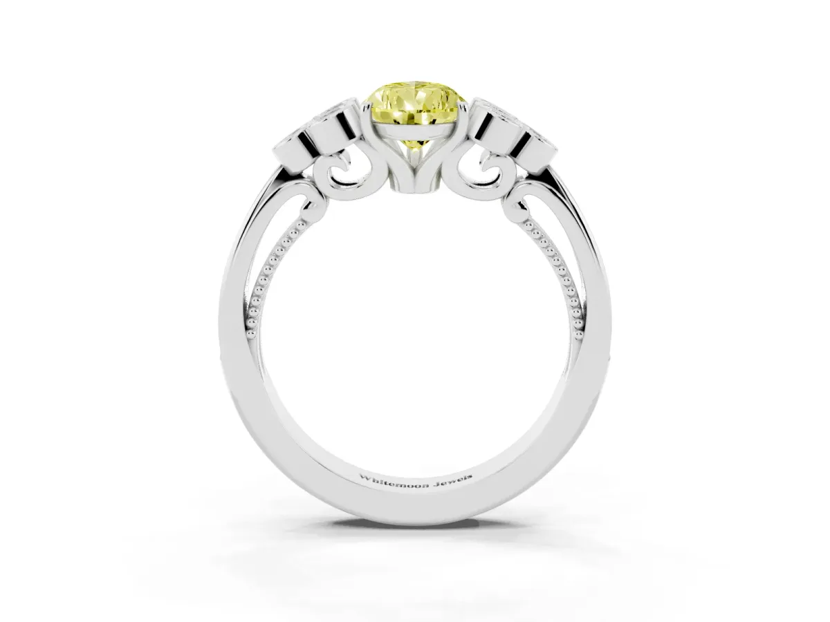 Fancy Yellow Pear Cut Cut Diamond Engagement Ring with Bezel Set Round Side Stones and Prong Setting Silver