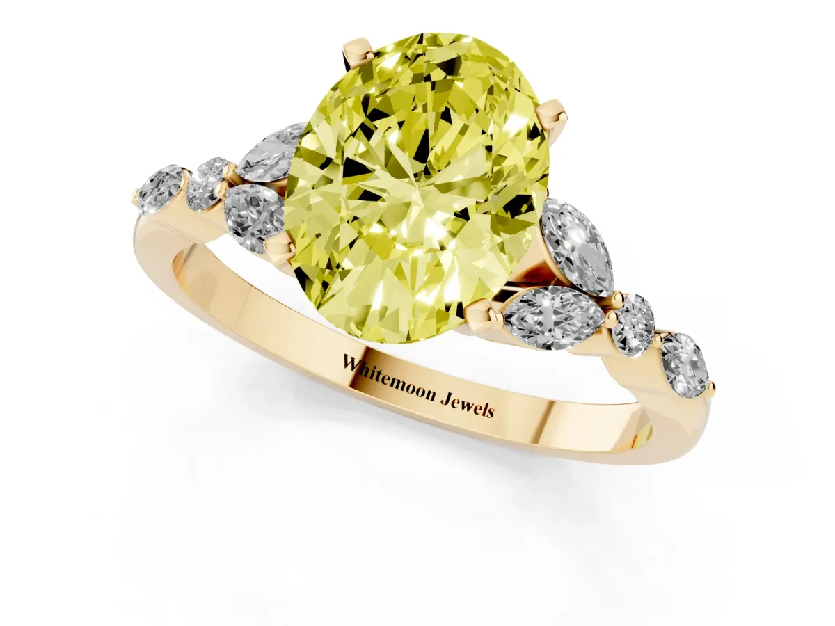 Fancy Yellow Oval Cut Diamond Solitaire Ring with Side Stones and Four-Prong Setting Yellow gold
