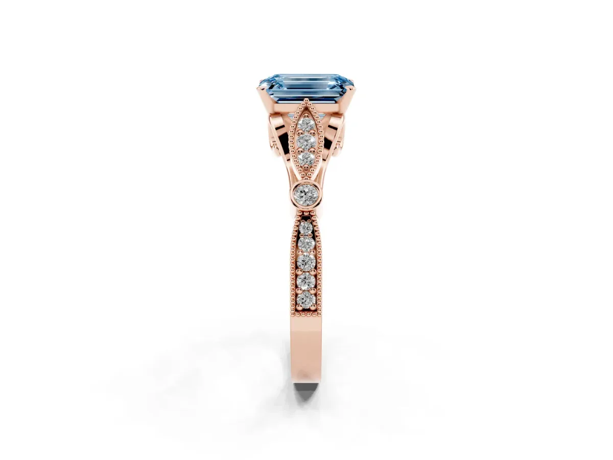Fancy Blue Emerald Cut Cut Diamond with Milgrain Marquise and Bezel Accents on a Solitaire Band with Prong Setting Rose gold