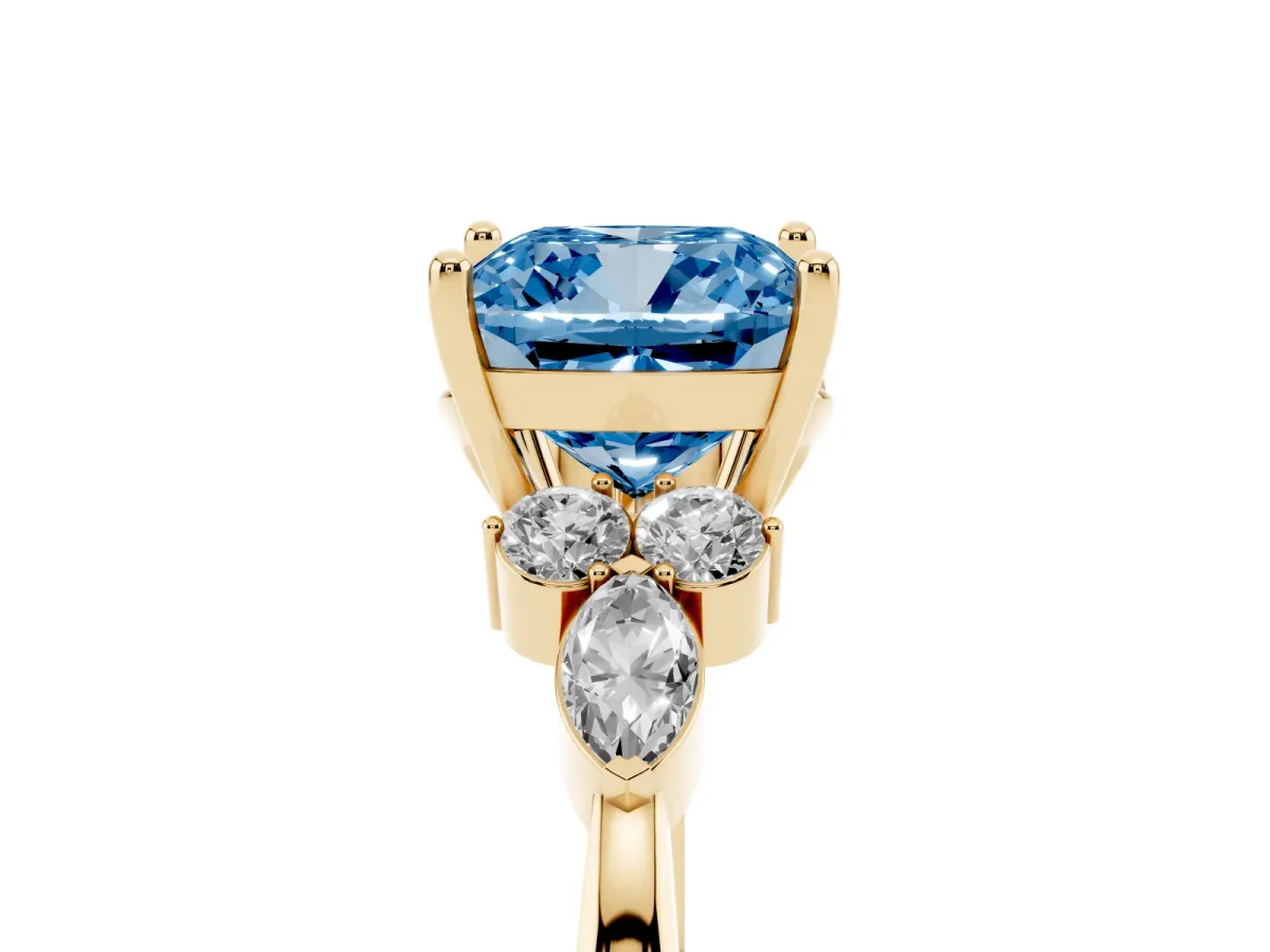 Fancy Blue Cushion Cut Brilliant Diamond Solitaire Ring with Pear Side Stones and Four-Prong Setting Yellow gold