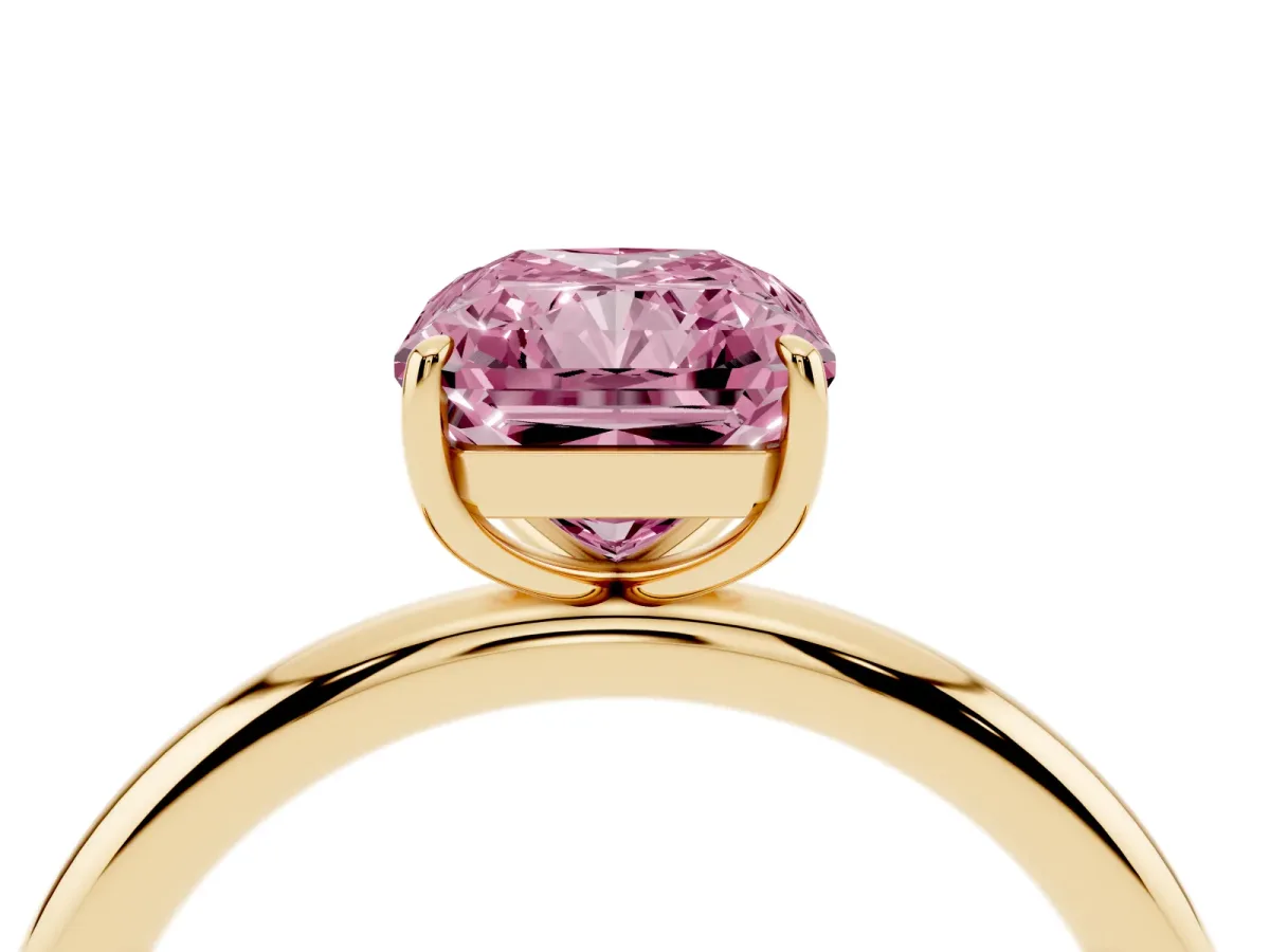 Fancy Pink Radiant Cut Solitaire Diamond Ring with Four-Prong Setting on a Plain Band Yellow gold