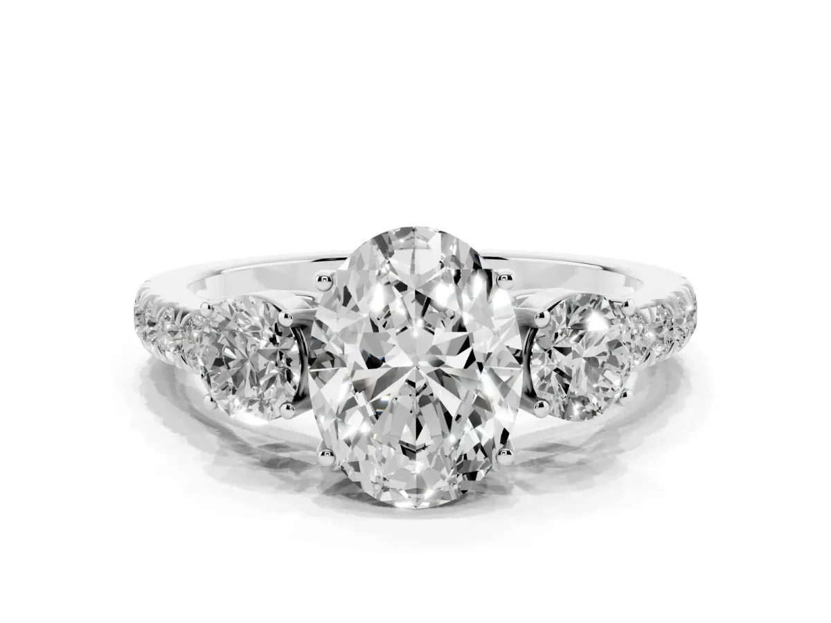 Oval Cut Cut Diamond Three-Stone Ring with Round Side Stones and Pavé Band Silver