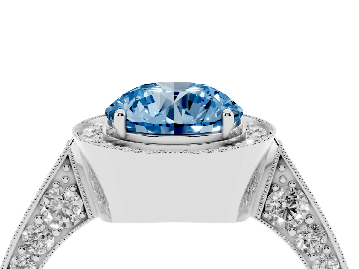 Fancy Blue Round Cut Halo Diamond Engagement Ring with Split Shank Band and Four-Prong Setting Silver