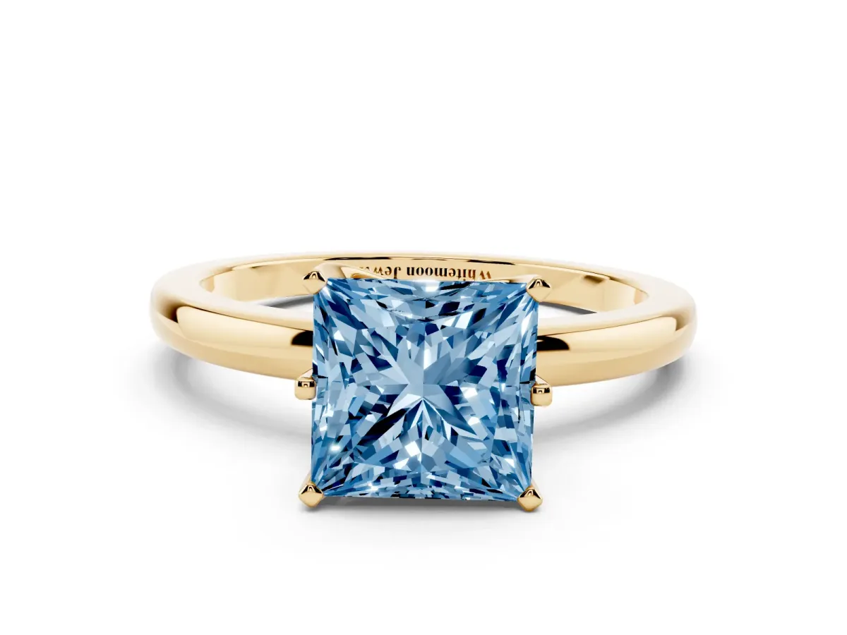 Fancy Blue Princess Cut Solitaire Diamond Ring with Six-Prong Setting on a Classic Band Yellow gold