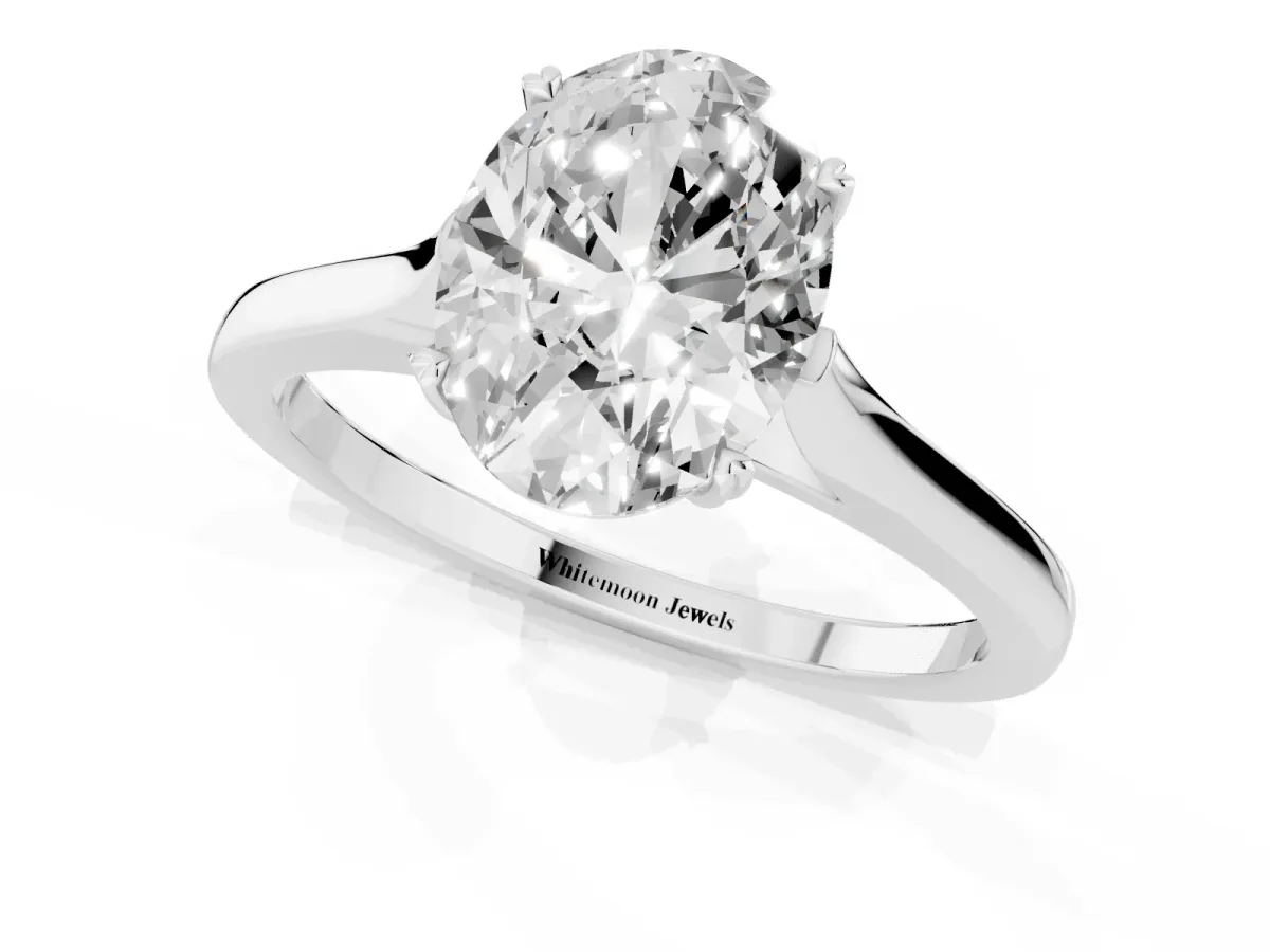 Oval Cut Solitaire Heart Prong Engagement Ring with Tapered Band White gold