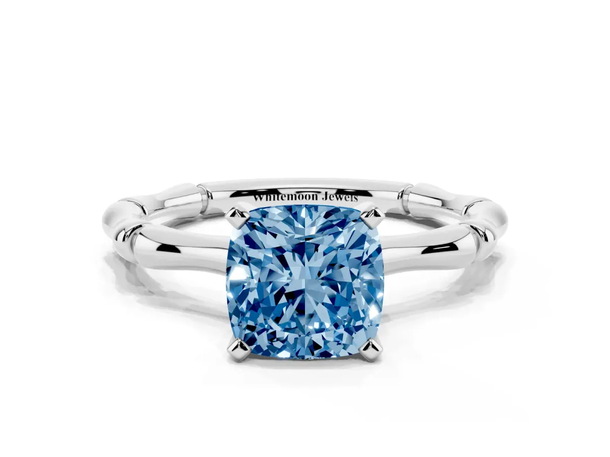 Fancy Blue Cushion Cut Solitaire Diamond Ring with Bamboo Band and Four-Prong Setting Silver