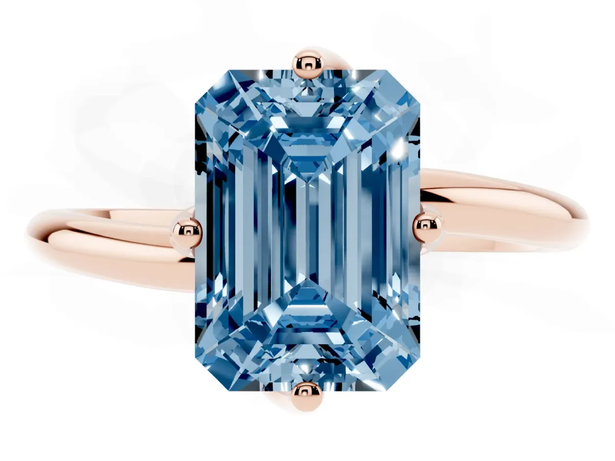 Fancy Blue Emerald Cut Diamond Solitaire Engagement Ring with Four-Prong Setting and Classic Band Rose gold