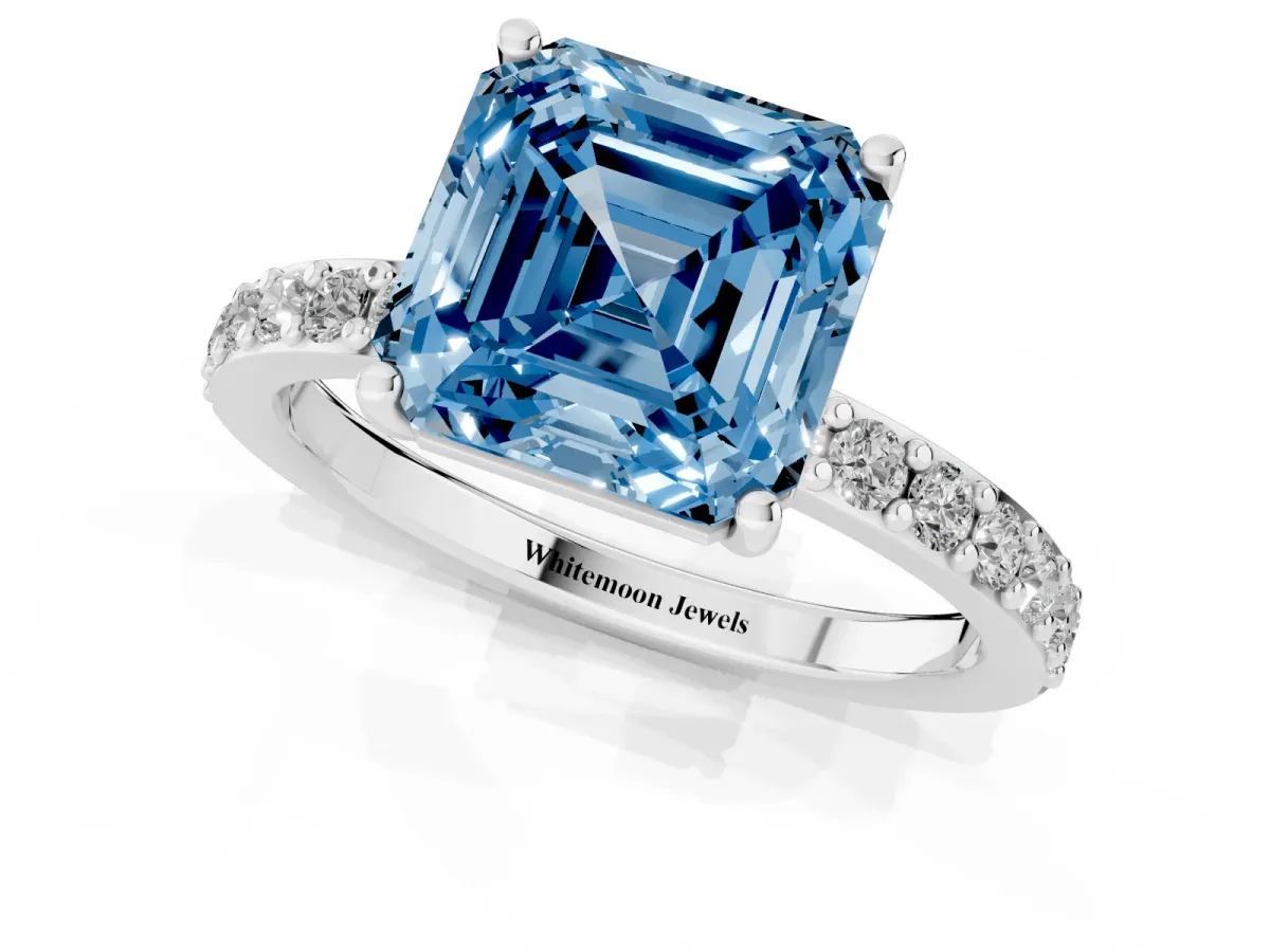 Fancy Blue Asscher Cut Cut Diamond Solitaire with Pave Band and Four-Prong Setting Silver