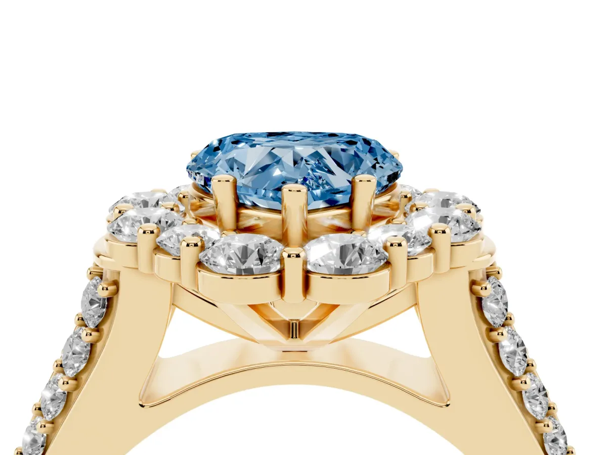 Fancy Blue Heart Cut Halo Diamond Engagement Ring with Split Shank and Prong Setting Yellow gold
