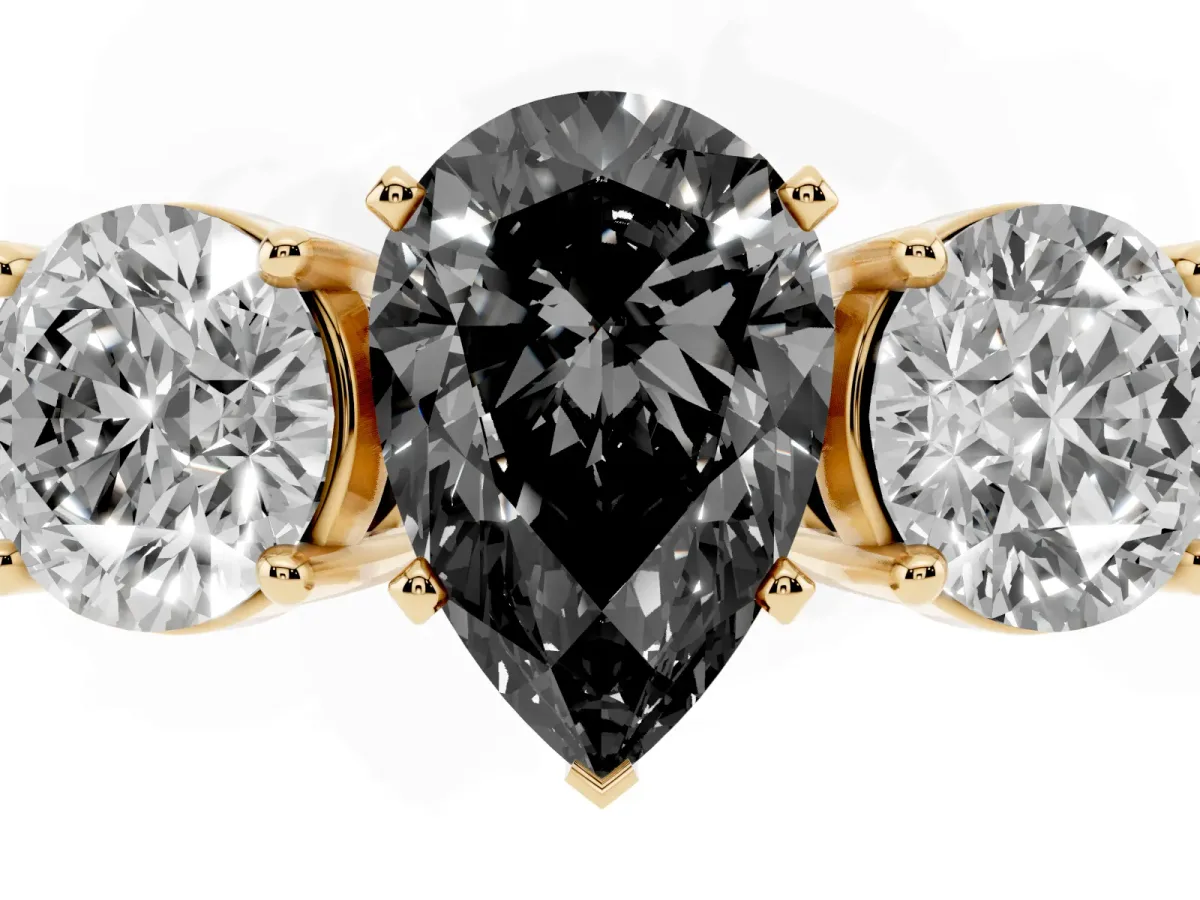 Fancy Black Three-Stone Pear Cut Diamond Ring with Round Side Stones, Classic Band, and Four-Prong Setting Yellow gold