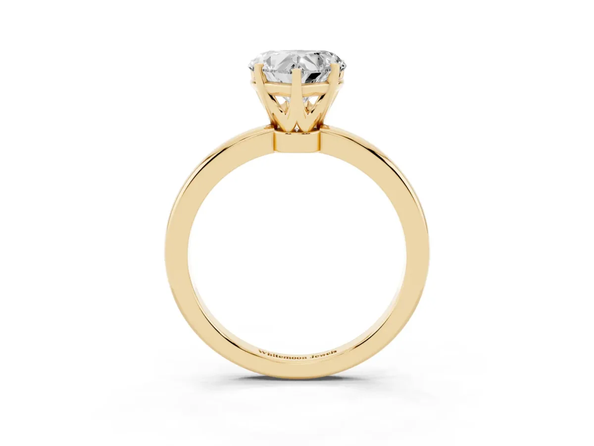 Heart Cut Solitaire Diamond Ring with Six-Prong Setting on a Classic Band Yellow gold