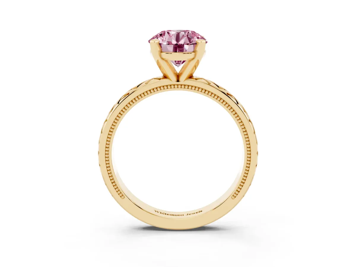 Fancy Pink Round Cut Solitaire Diamond Ring with Milgrain and Black Enamel X Pattern Band Yellow gold
