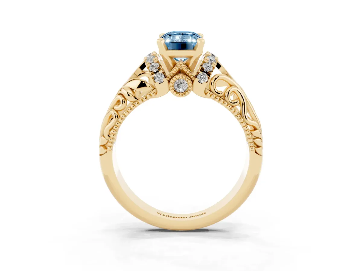 Fancy Blue Emerald Cut Solitaire Filigree Engagement Ring with Halo and Prong Setting Yellow gold