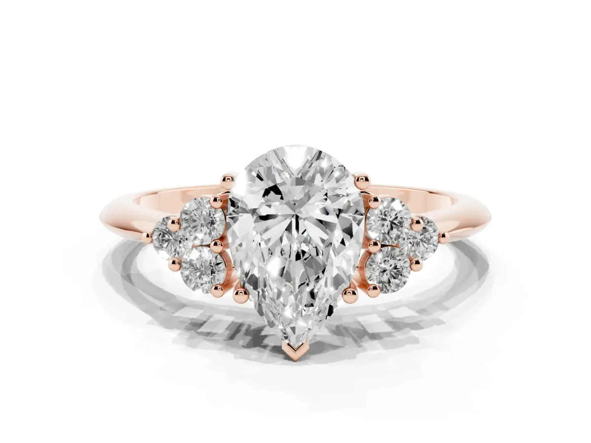 Pear Cut Cut Diamond Cluster Ring with Solitaire Band and Four-Prong Setting Rose gold