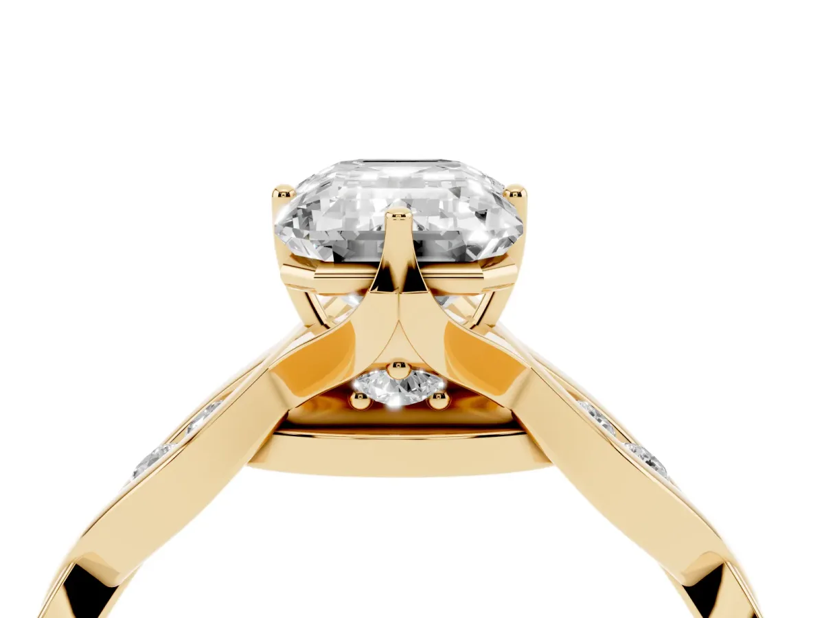 Emerald Cut Solitaire Twist Band with Leaf Prong Setting Yellow gold