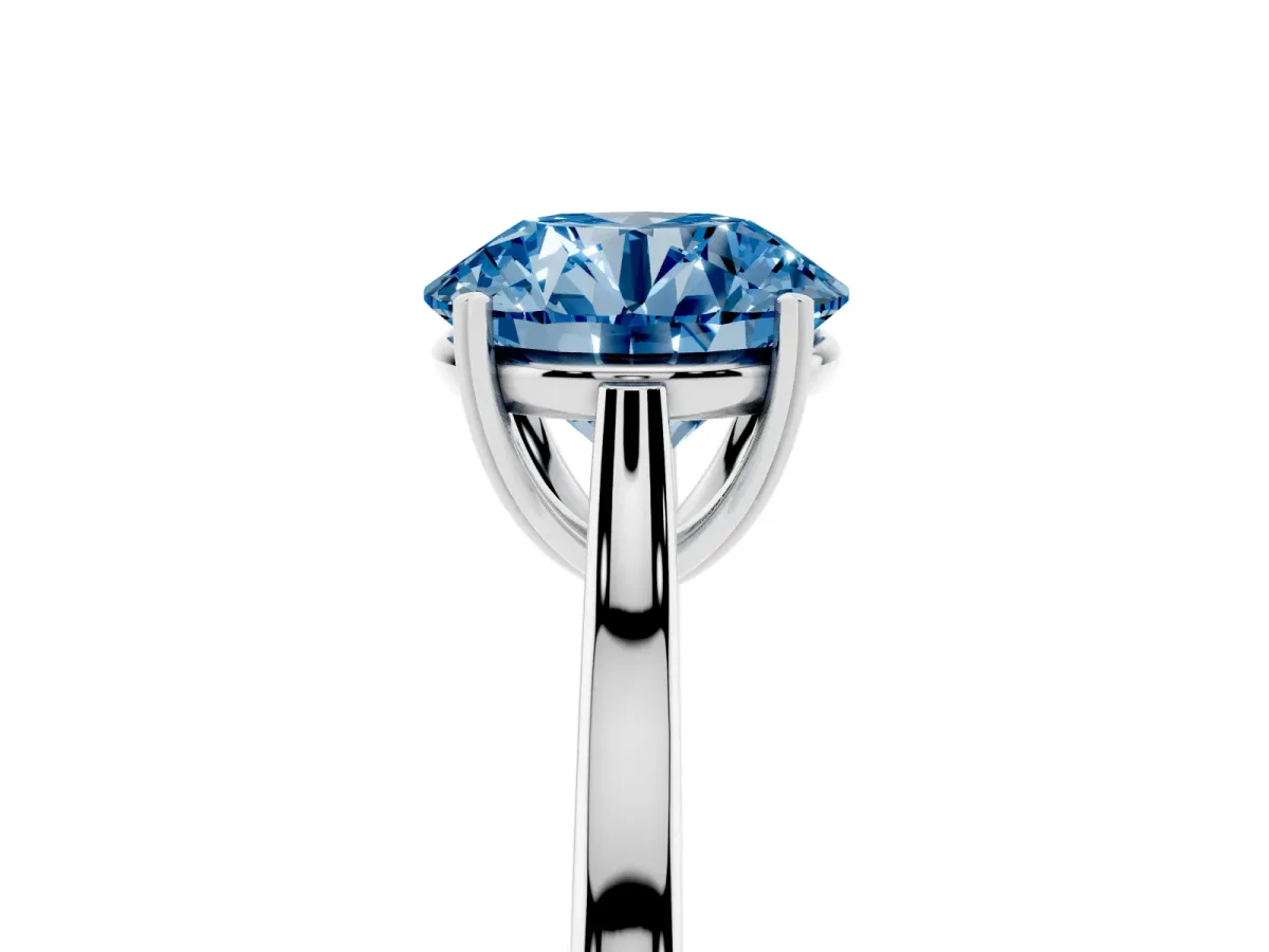 Fancy Blue Round Cut Solitaire Heart Prong Engagement Ring with Tapered Band Silver