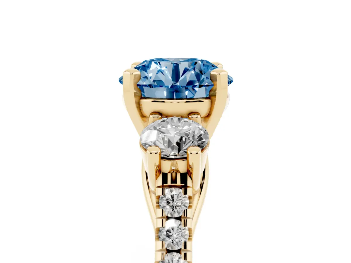 Fancy Blue Three-Stone Round Cut Diamond Pavé Band with Four-Prong Setting Yellow gold