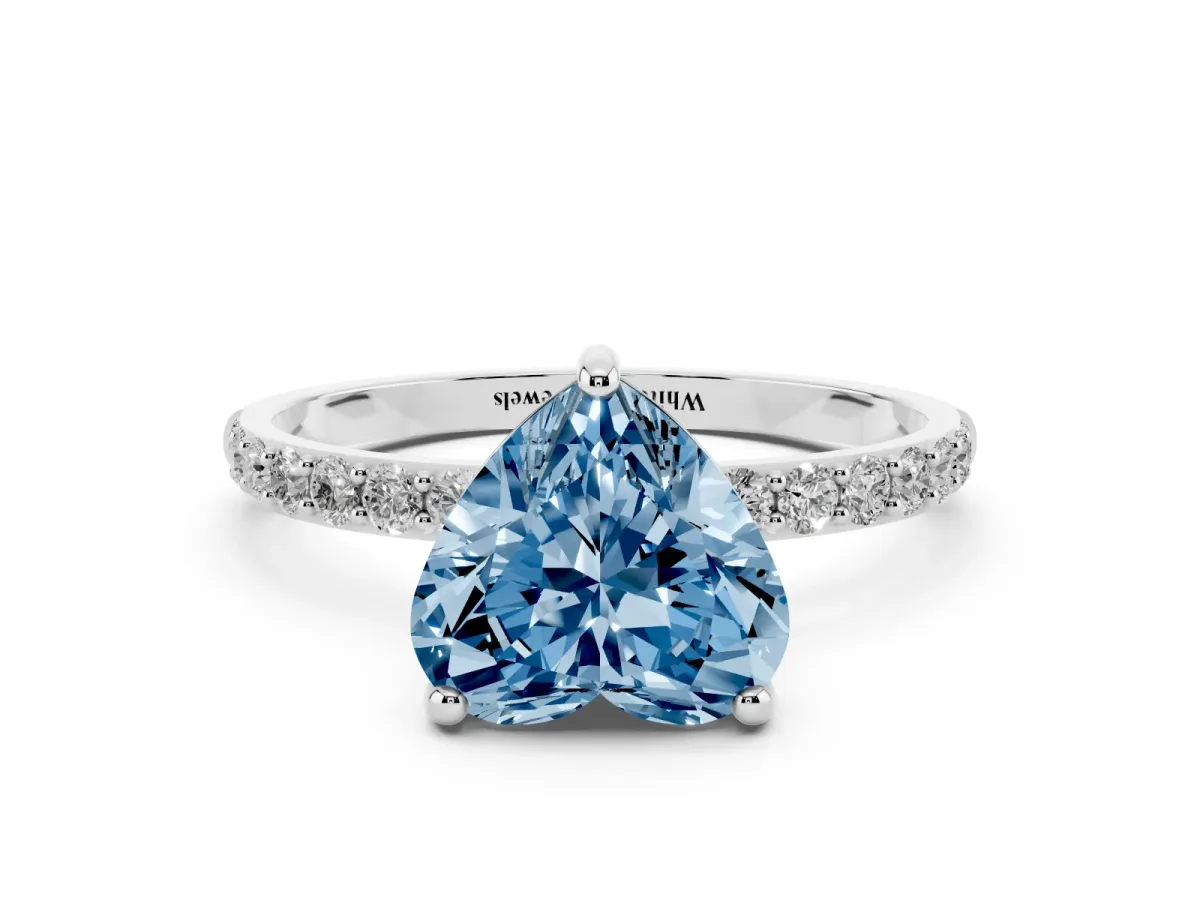 Fancy Blue Heart Cut Diamond Solitaire Ring with Round Pavé Band and Prong Setting Silver