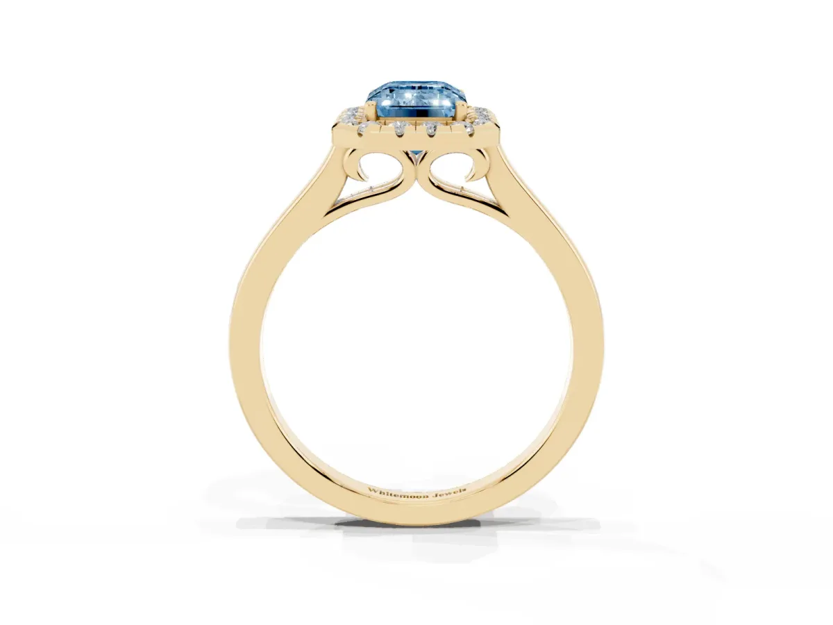 Fancy Blue Emerald Cut Halo Round Diamond Solitaire Ring with Pavé Band and Four-Prong Setting Yellow gold