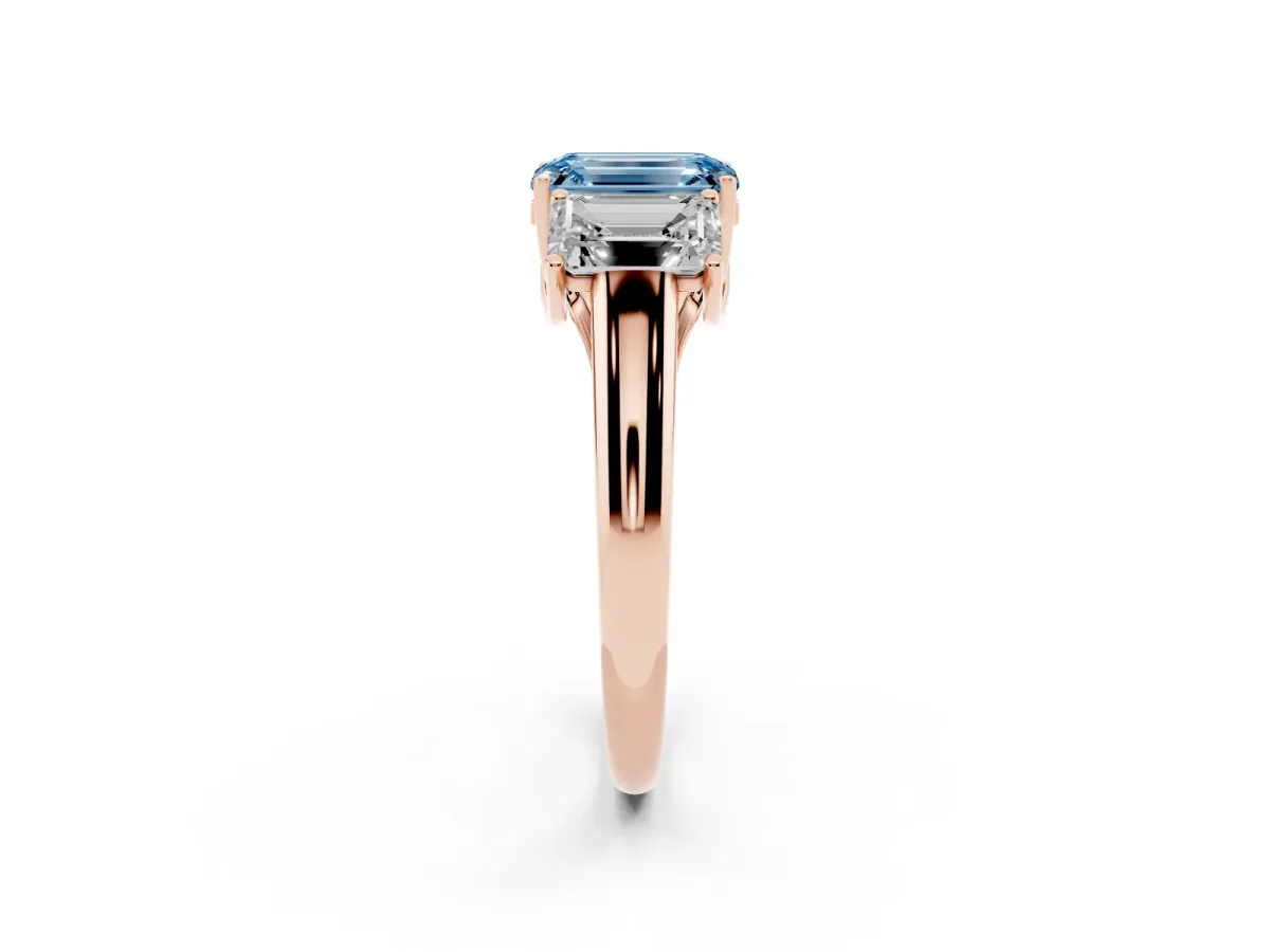 Fancy Blue Three-Stone Emerald Cut Diamond Engagement Ring with Prong Setting Rose gold