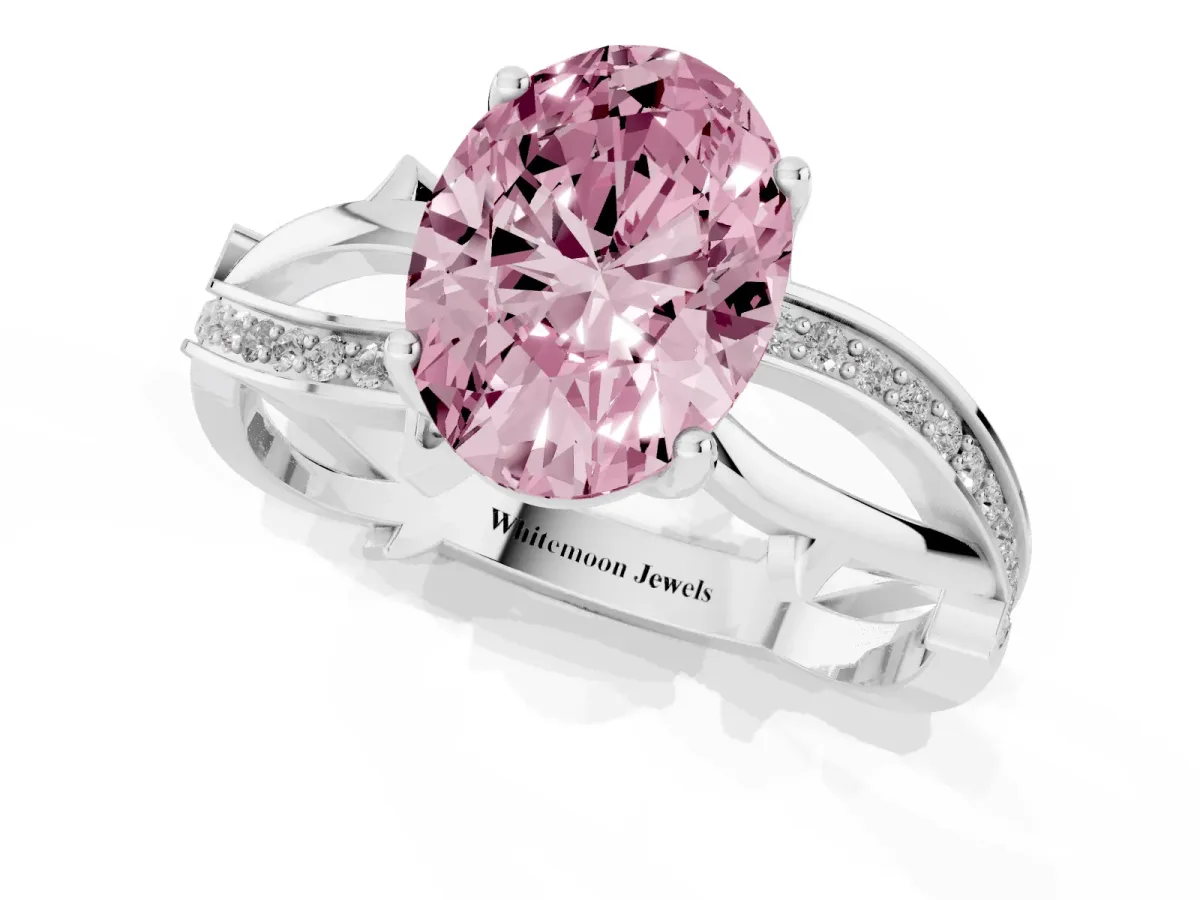 Fancy Pink Oval Cut Solitaire Twist Band with Pavé Accents and Four-Prong Setting Silver