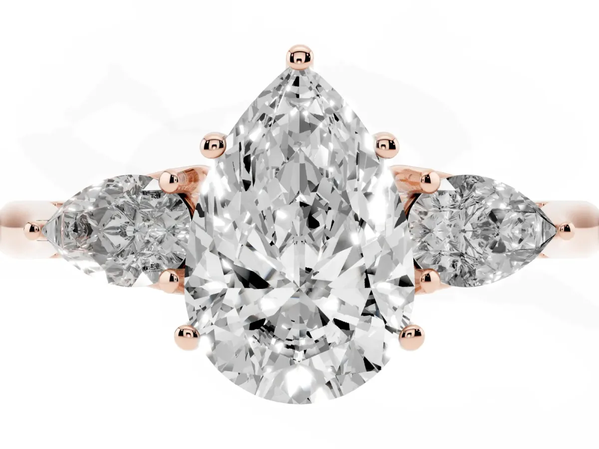 Three-Stone Pear Cut Brilliant Diamond Solitaire Ring with Tapered Band and Four-Prong Setting Rose gold