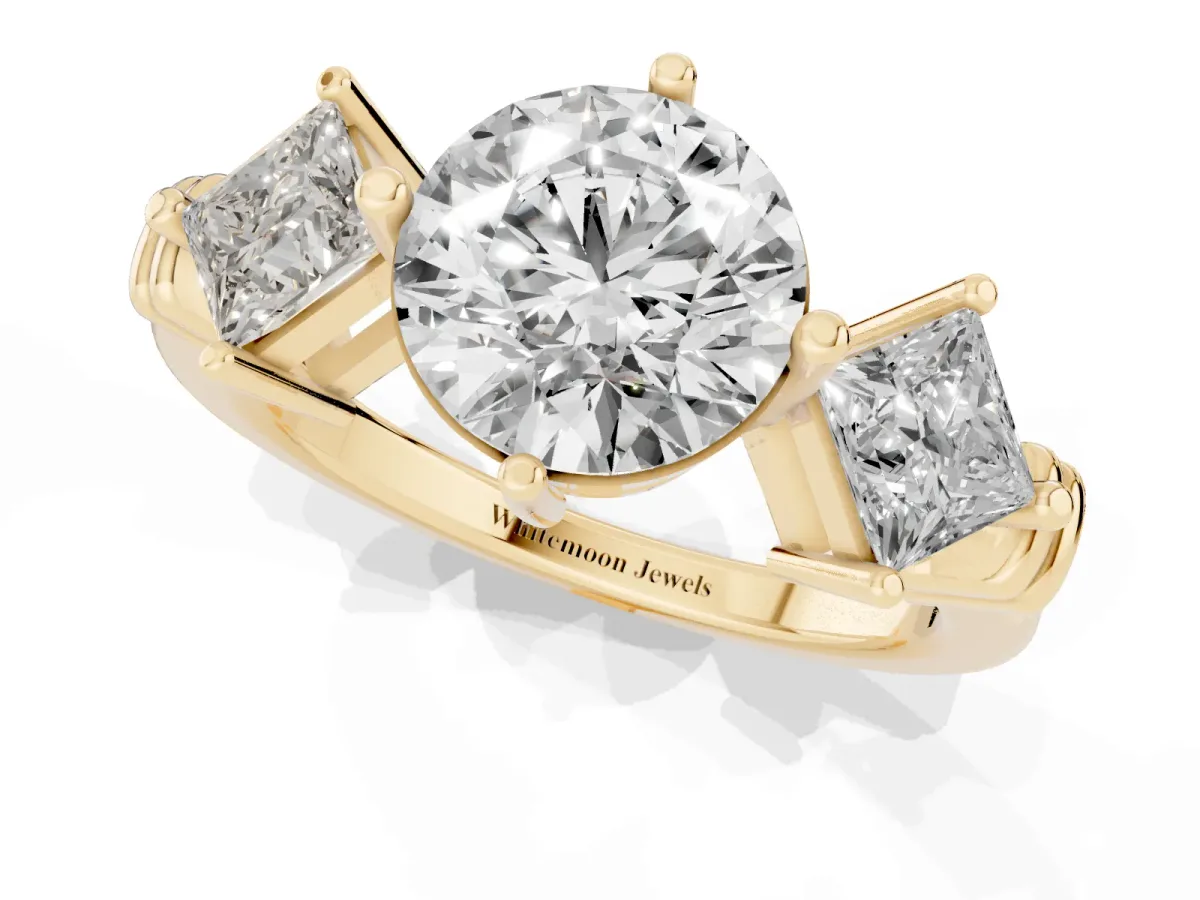 Three-Stone Round Cut and Princess Cut Diamond Ring with Channel Band and Four-Prong Setting Yellow gold
