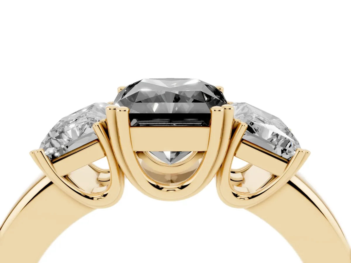 Fancy Black Three-Stone Radiant Cut Cut Diamond Ring with Channel Set Band and Four-Prong Setting Yellow gold