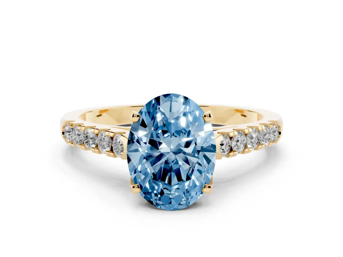 Fancy Blue Oval Cut Diamond Pavé Band Solitaire Ring with Prong Setting Yellow gold