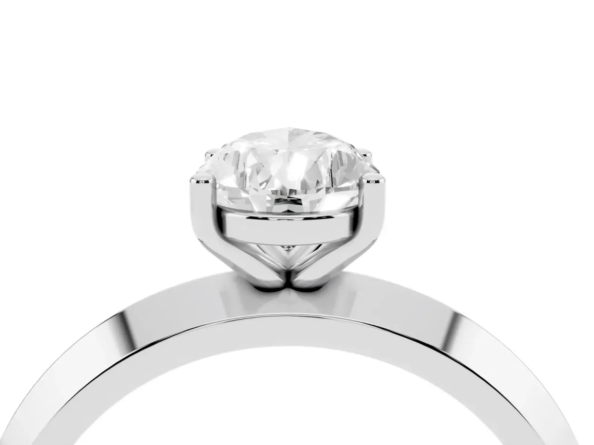Pear Cut Cut Solitaire Engagement Ring with Flat Band and Four-Prong Setting Platinum