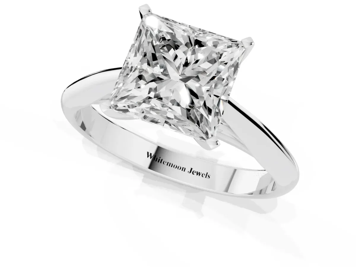 Princess Cut Diamond Solitaire Engagement Ring with Cathedral Setting and Four-Prong Mount Platinum