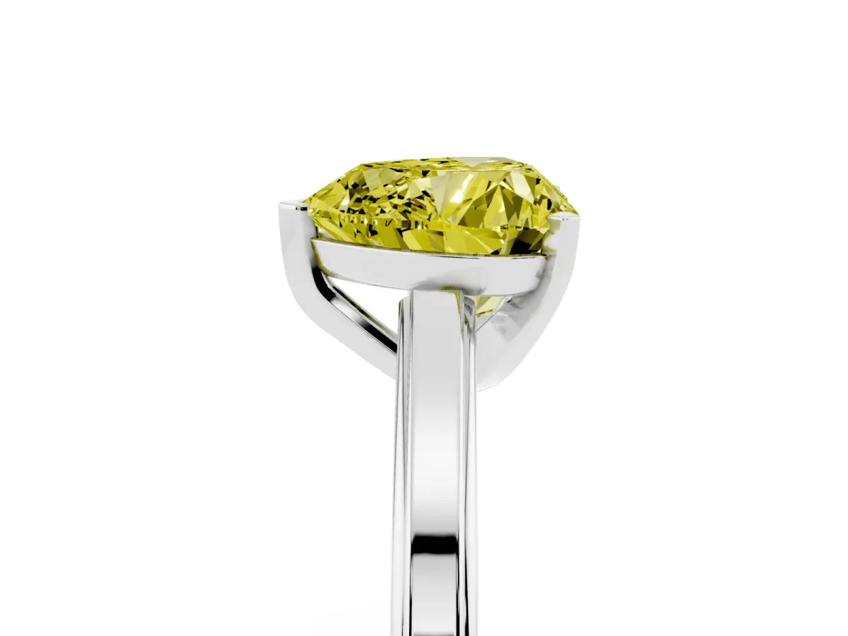 Fancy Yellow Heart Cut Solitaire Diamond Ring with Four-Prong Setting and Classic Band Silver