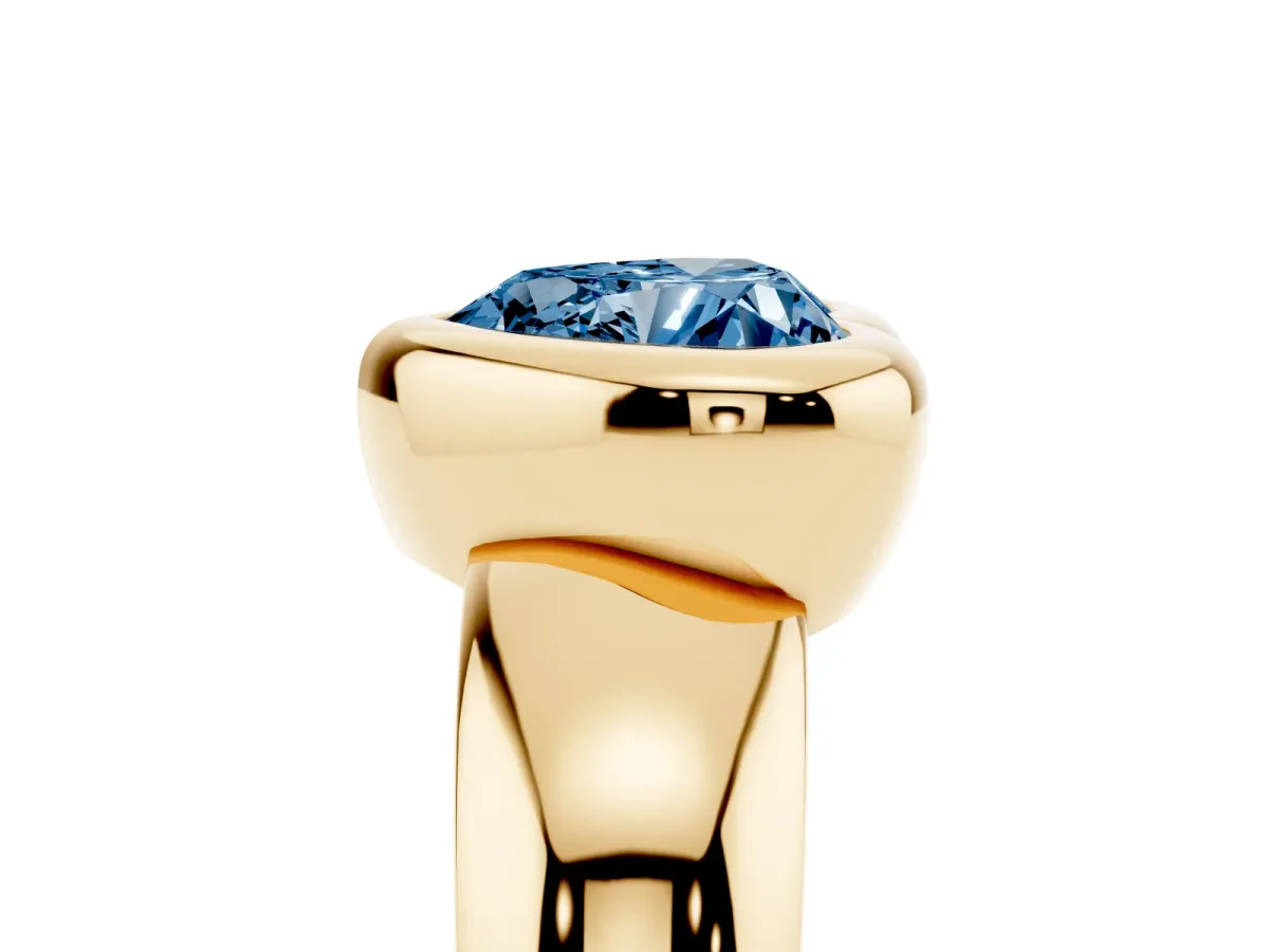 Fancy Blue Bezel Set Heart Cut Solitaire Ring with Wide Band Yellow gold