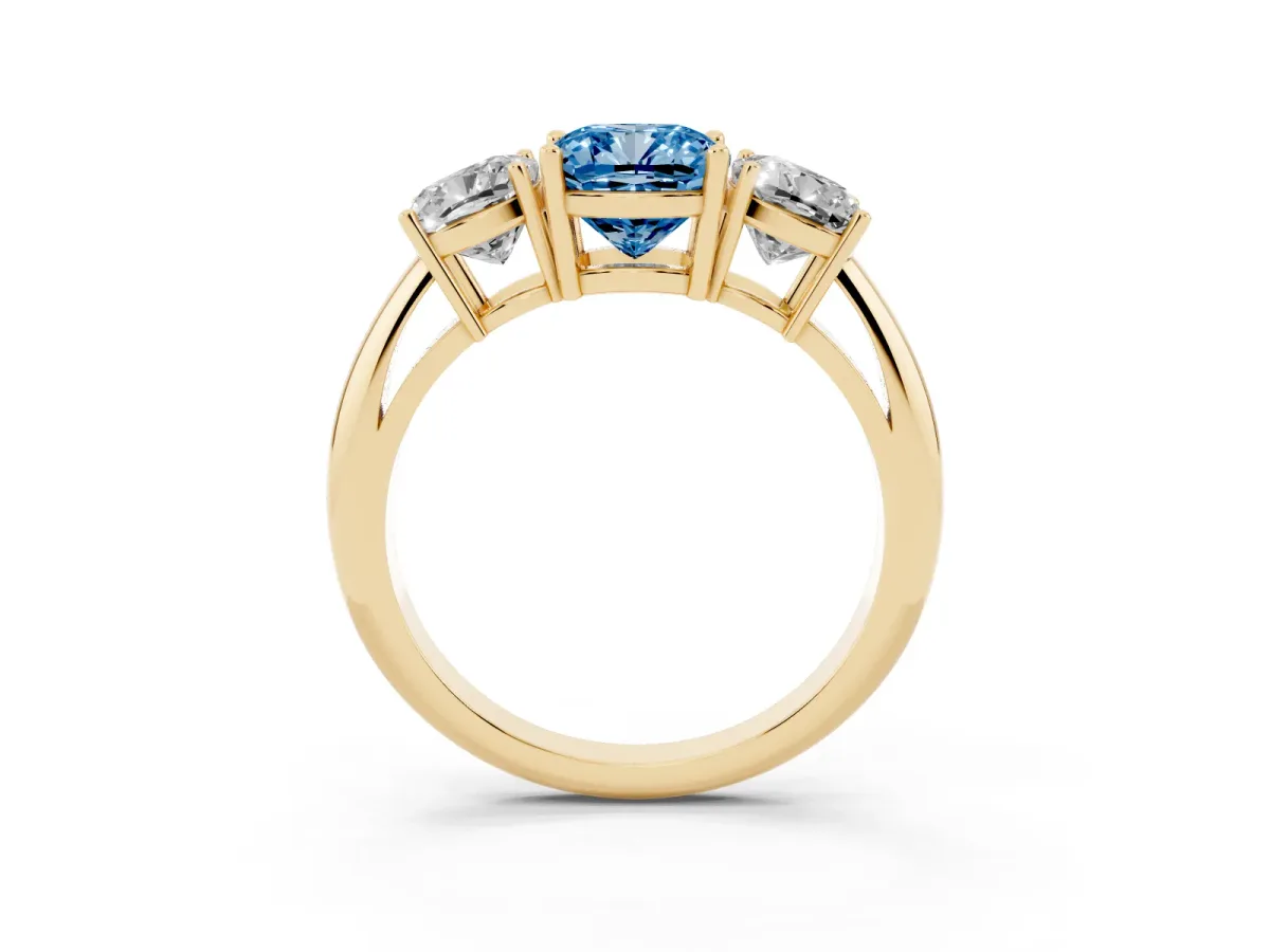 Fancy Blue Three-Stone Cushion Cut Cut Diamond Engagement Ring with Prong Setting on a White Gold Band Yellow gold