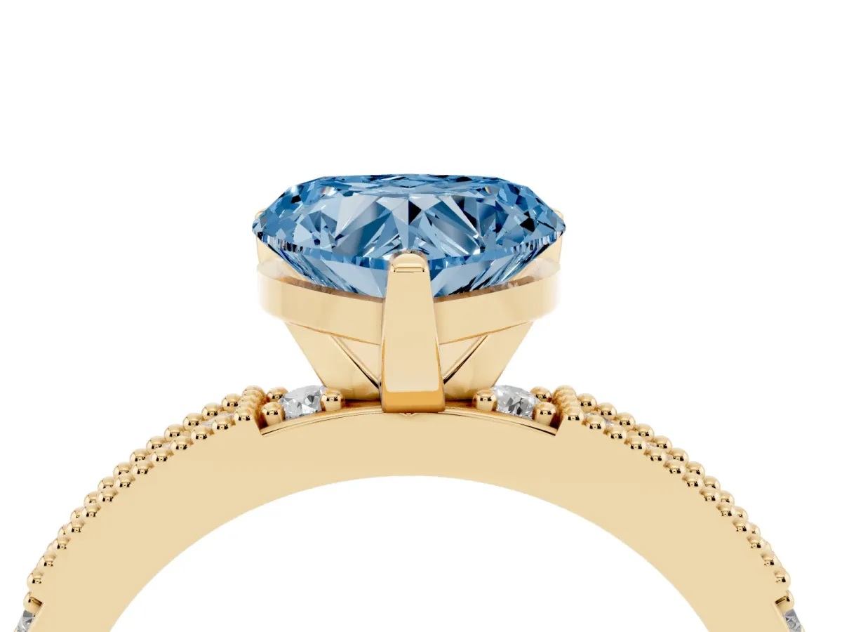 Fancy Blue Heart Cut Solitaire with Pavé Band and Four-Prong Setting Yellow gold