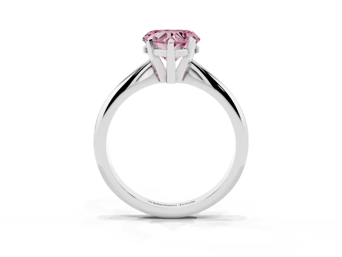 Fancy Pink Heart Cut Cut Solitaire Ring with Four-Prong Setting on a Classic Band Silver