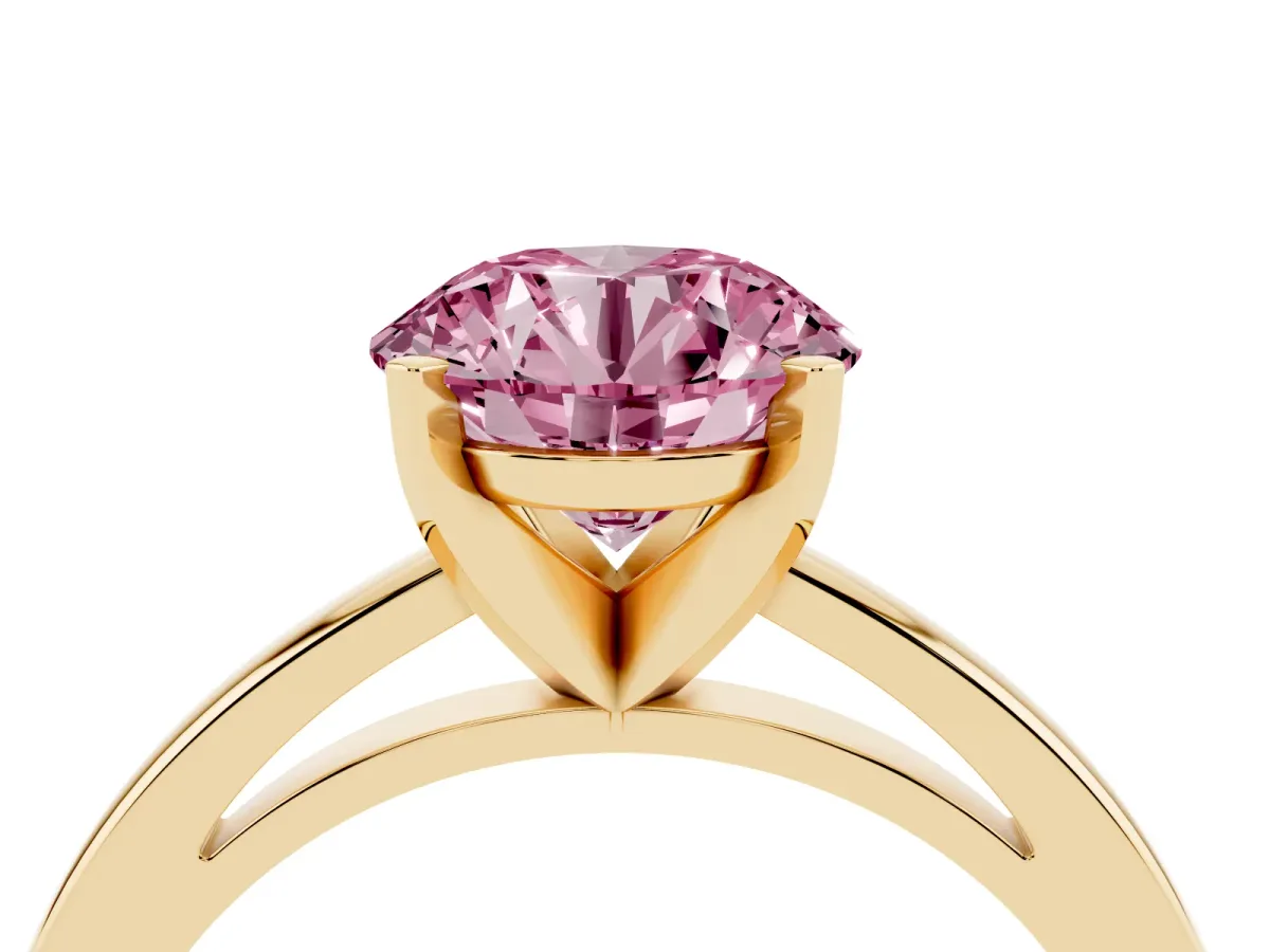 Fancy Pink Round Cut Solitaire Diamond Engagement Ring with Four-Prong Setting on a Classic Band Yellow gold