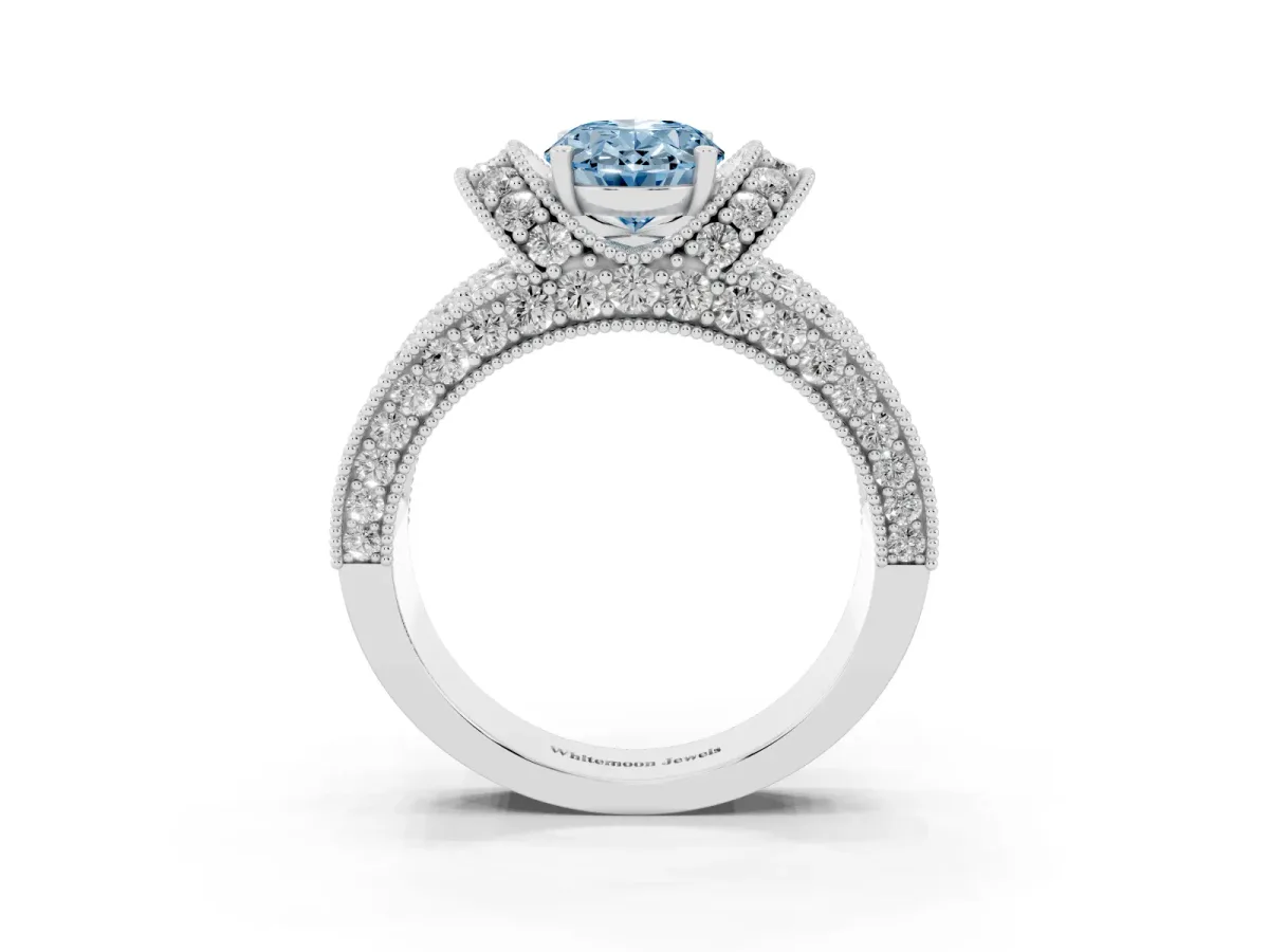 Fancy Blue Oval Cut Halo Pave Diamond Engagement Ring with Milgrain Detailing White gold