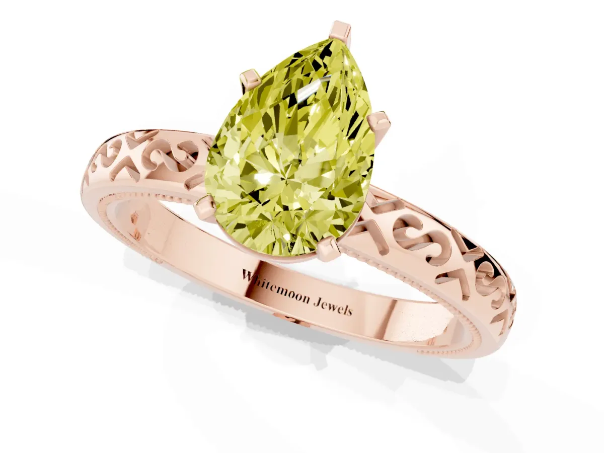 Fancy Yellow Pear Cut Solitaire Engagement Ring with Scrollwork Band and Four-Prong Setting Rose gold