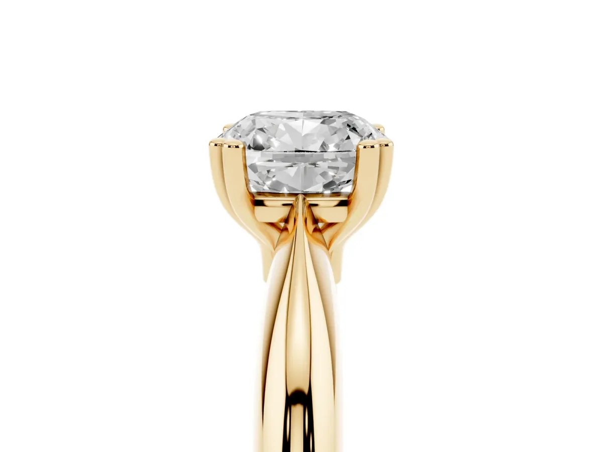 Cushion Cut Cut Solitaire Engagement Ring with Tapered Band and Four-Prong Setting Yellow gold
