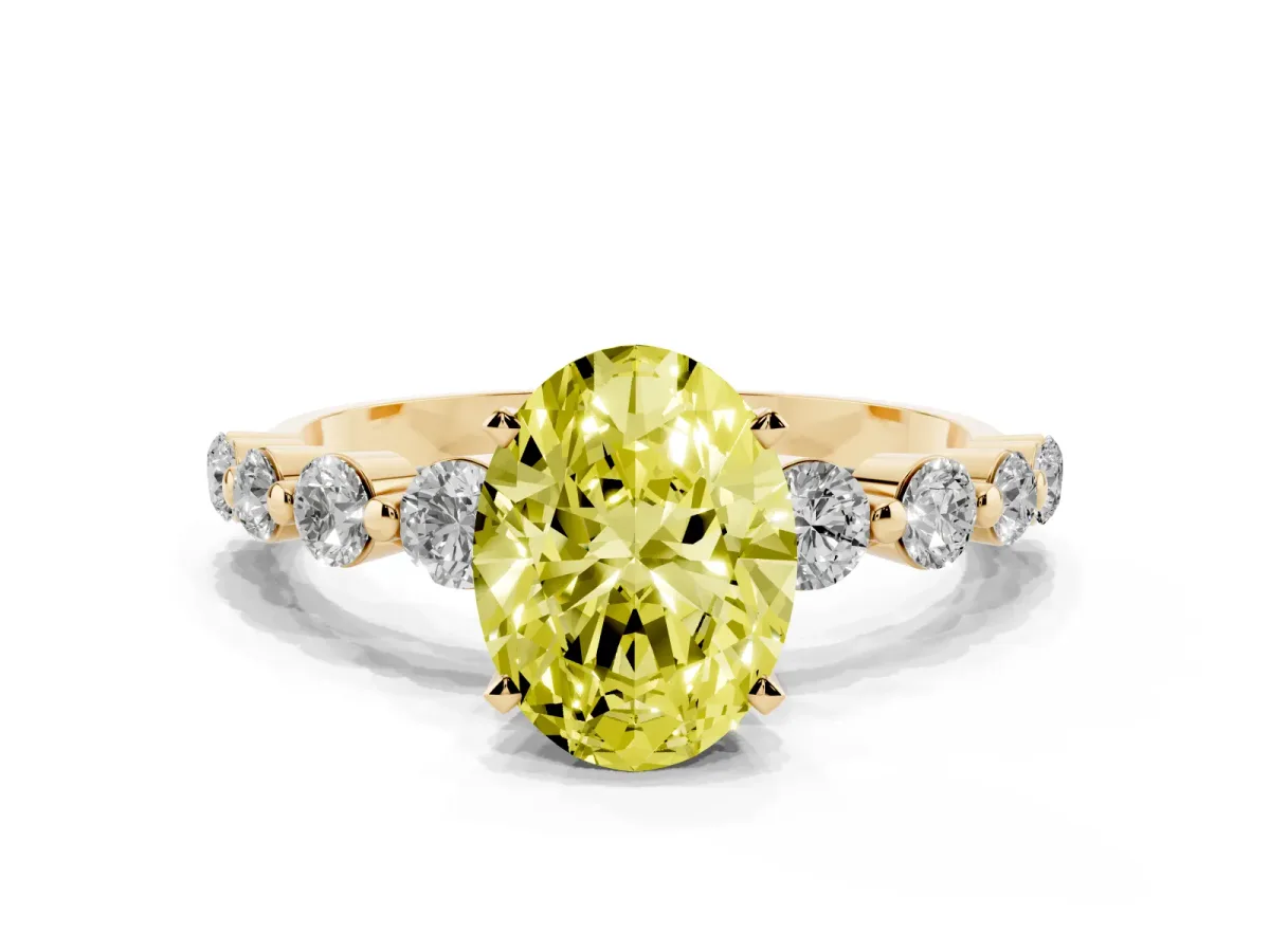 Fancy Yellow Oval Cut Solitaire Diamond Ring with Pave Band and Four-Prong Setting Yellow gold